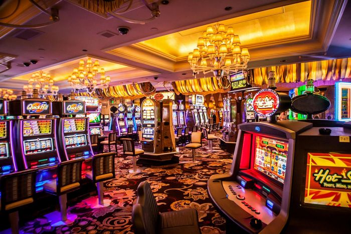 Arcade machine with lights turned on inside room